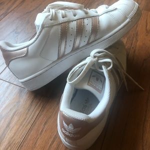 Rose gold Adidas superstar shoes